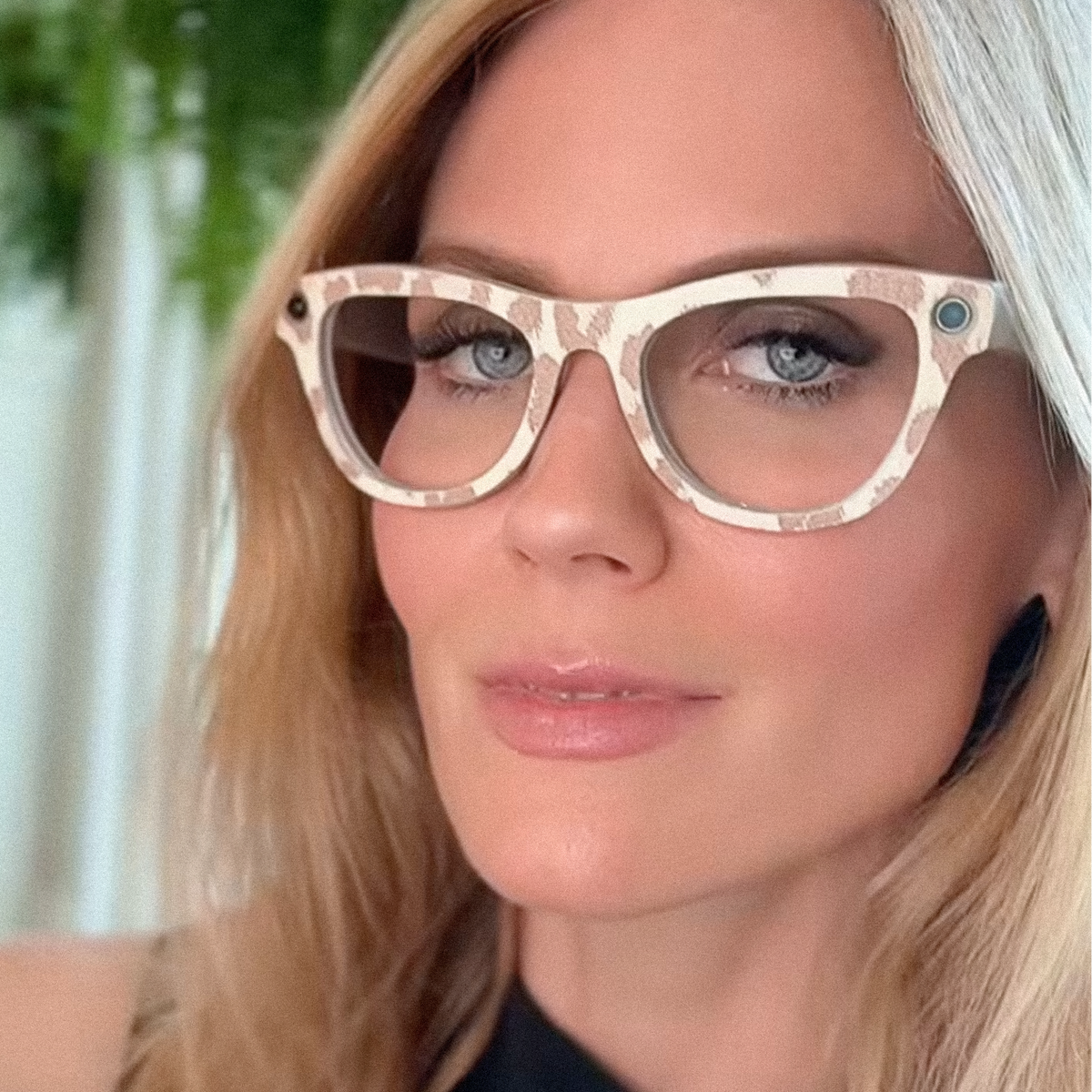 woman wearing Leopard ivory and tan AI glasses wrap on Ray-Ban Meta [frame] glasses
